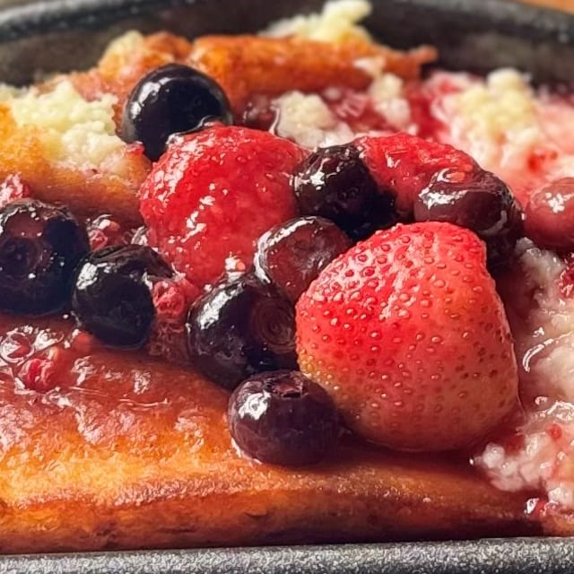 Breakfast Soufflé with Berry Sauce.